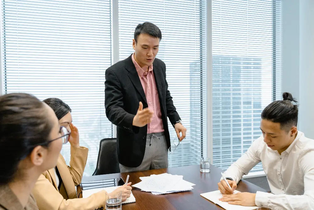 Asian SME leadership team in a strategy meeting